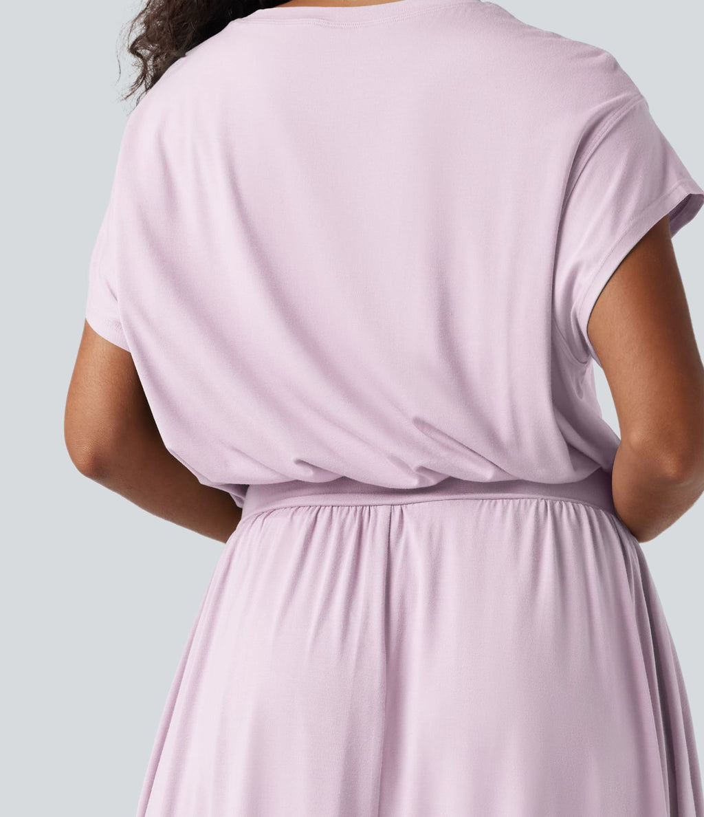 Robe de travail mi-longue fluide gainante à manches chauve-souris avec poches