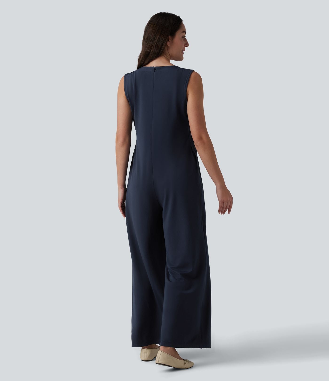 Combinaison casual ample décolleté plongeant sans manches plissée à nœud devant et fermeture éclair invisible avec poches