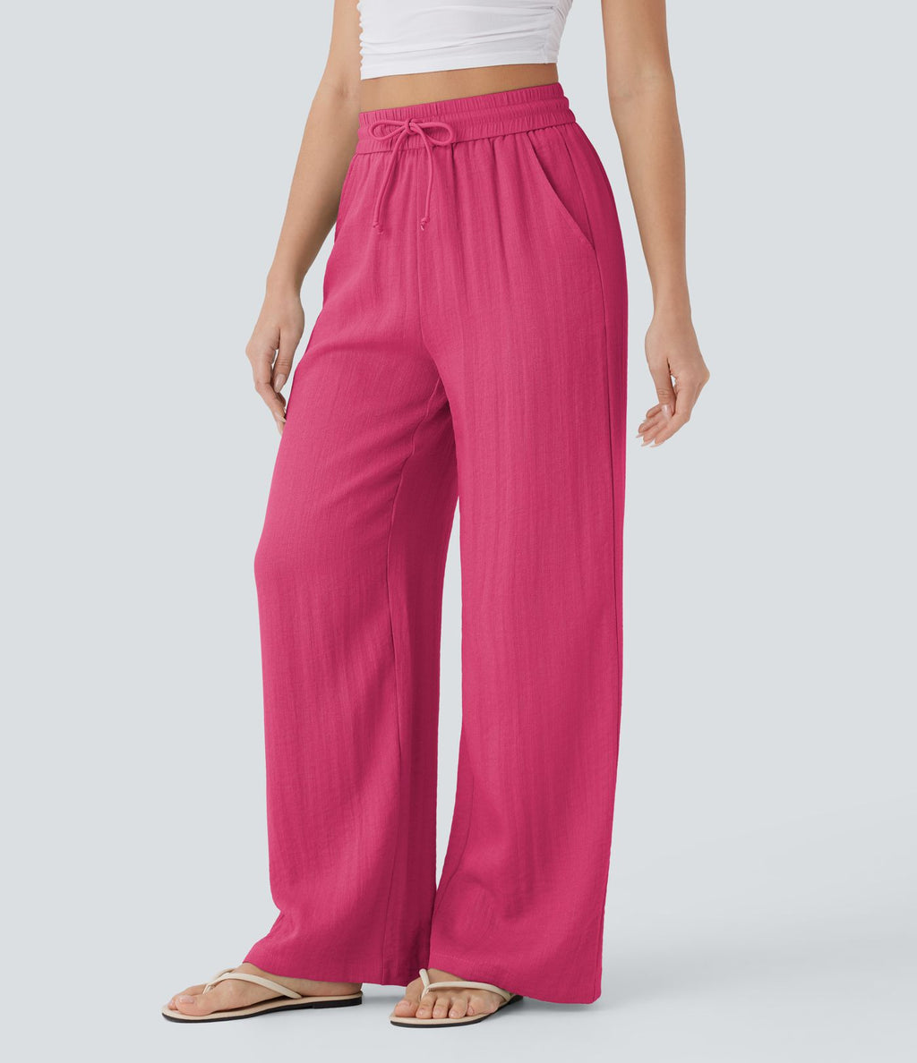 Pantalon large fluide taille haute avec cordon de serrage, poches latérales et aspect lin