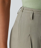 Pantalon large fluide taille mi-haute aspect lin avec ceinture et poches
