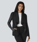 Veste de travail à pans asymétriques, boutons, passants pour pouces, poches latérales et empiècements contrastés