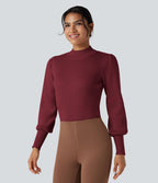 Pull col montant manches bouffantes longues
