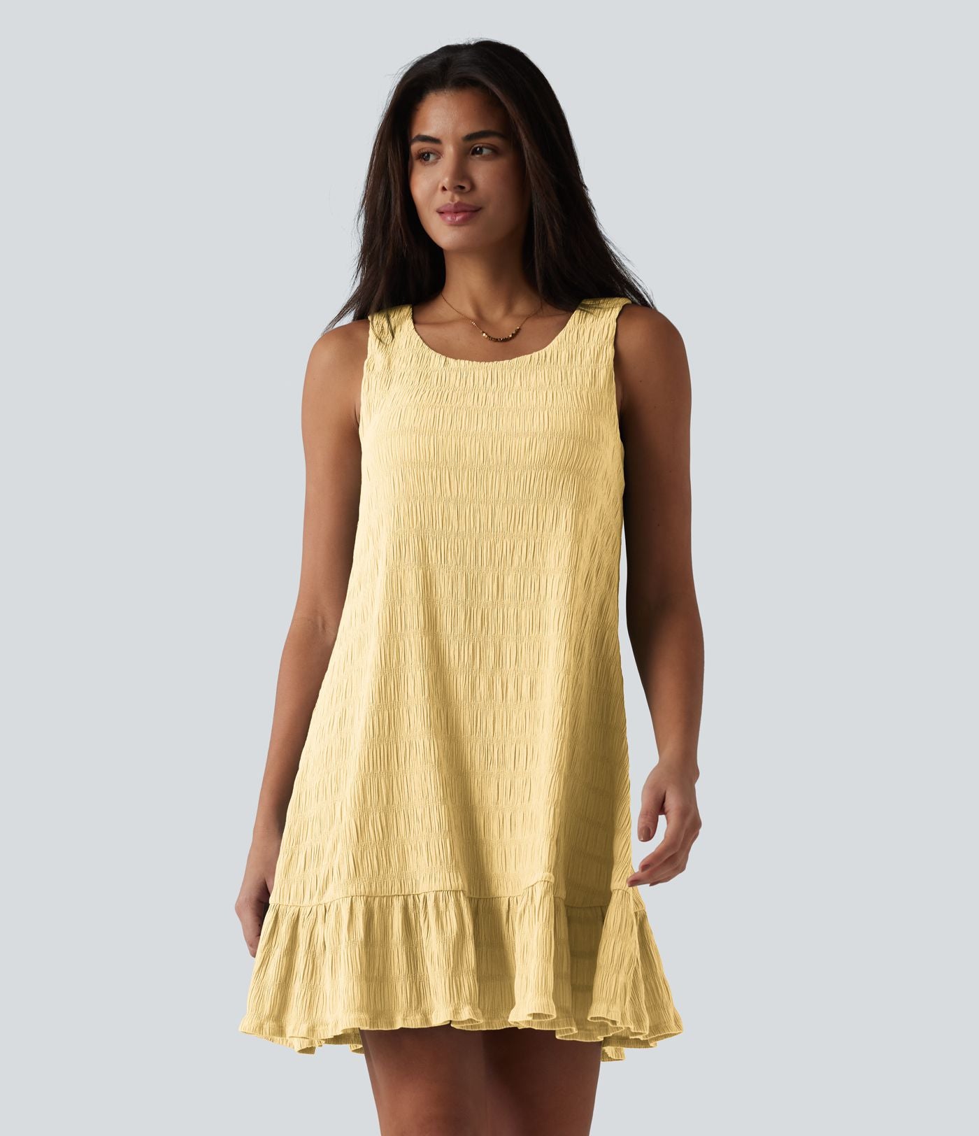 Robe courte décontractée sans manches à col rond, soutien-gorge intégré et ourlet à volants