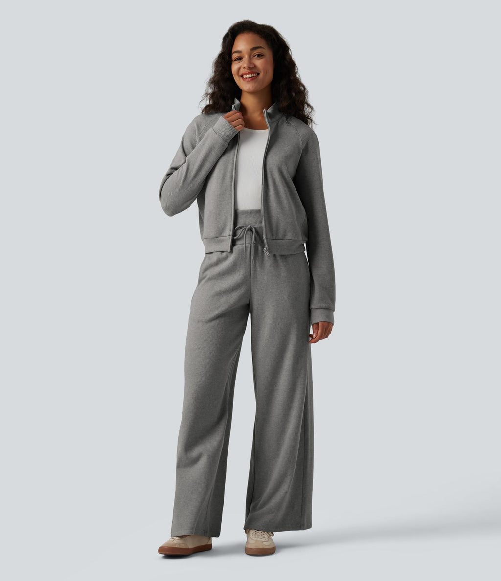 Veste casual côtelée à col montant, manches longues et fermeture zippée avec poches