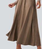 Jupe mi-longue évasée daim taille haute avec poches