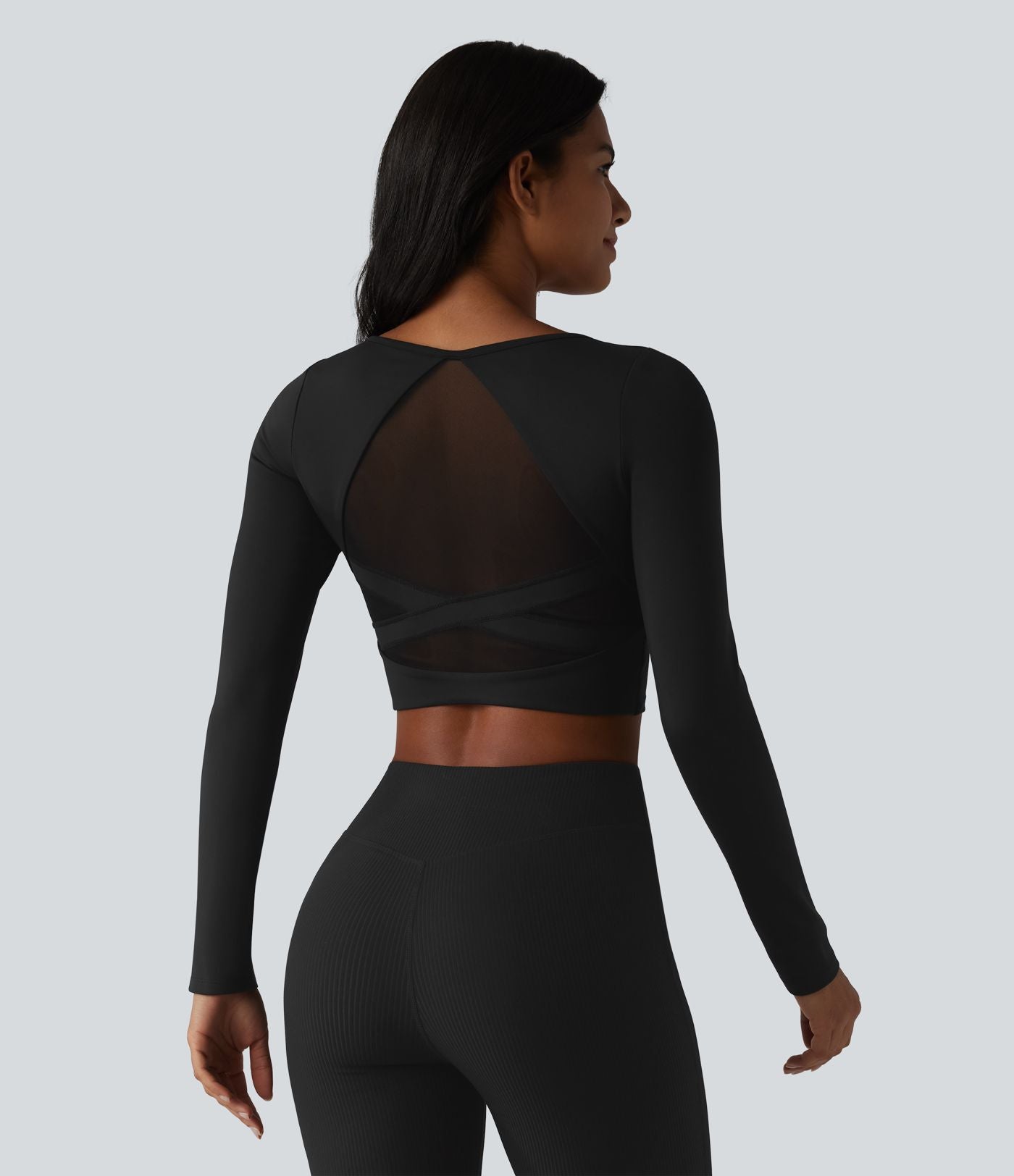 Haut de sport manches longues en mesh respirant avec brassière intégrée