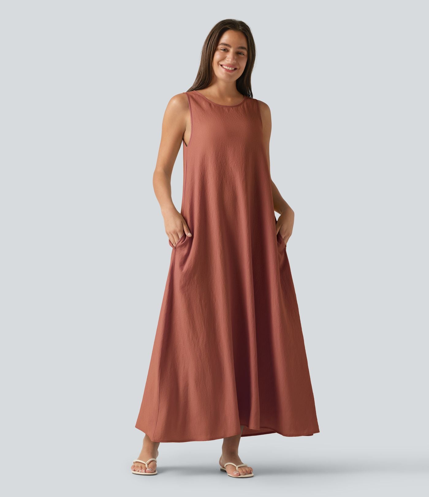 Robe débardeur midi unie sans manches à col rond et poches