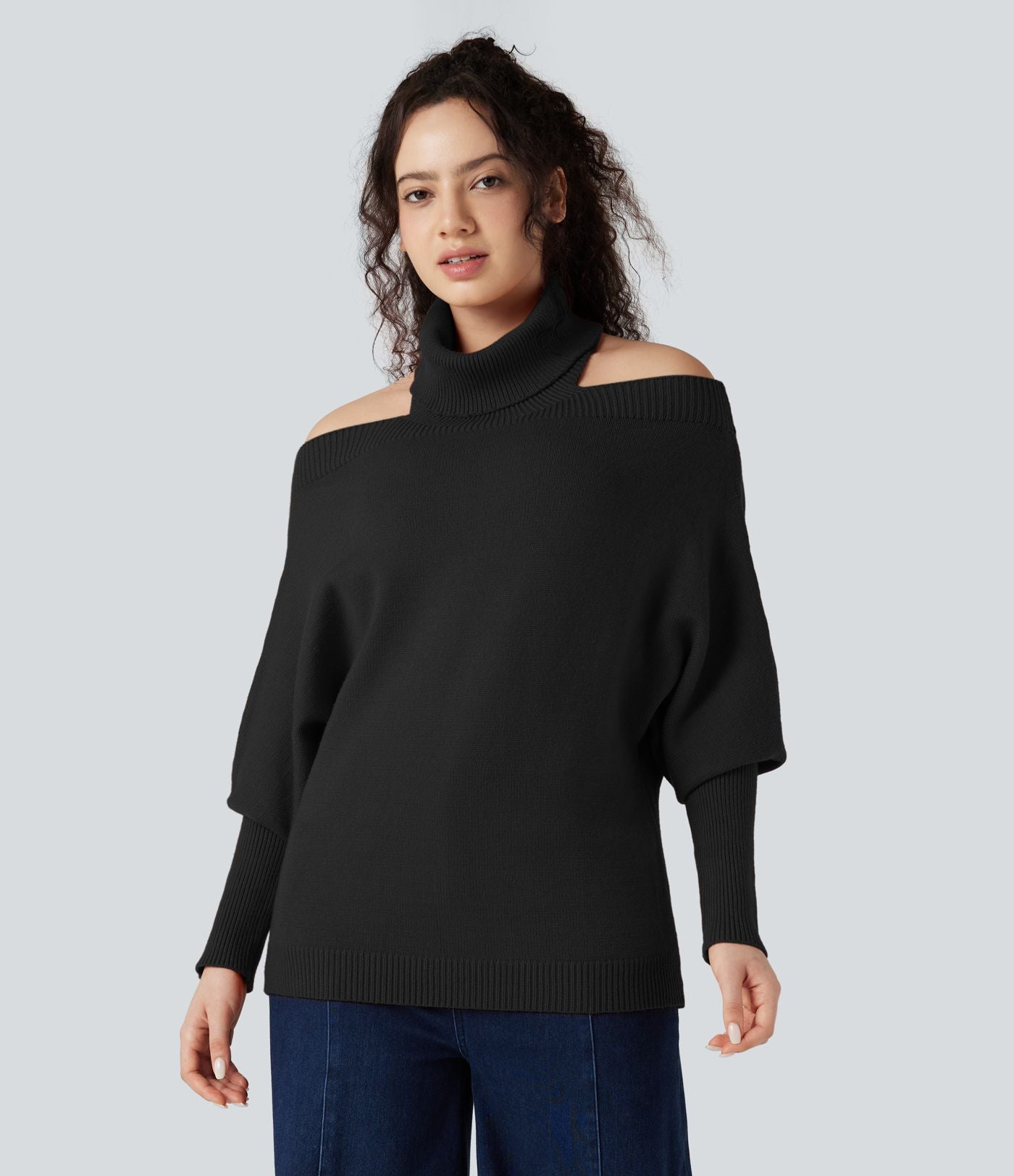 Pull col montant épaules dénudées manches chauve-souris longues