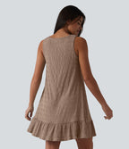 Robe courte décontractée sans manches à col rond, soutien-gorge intégré et ourlet à volants