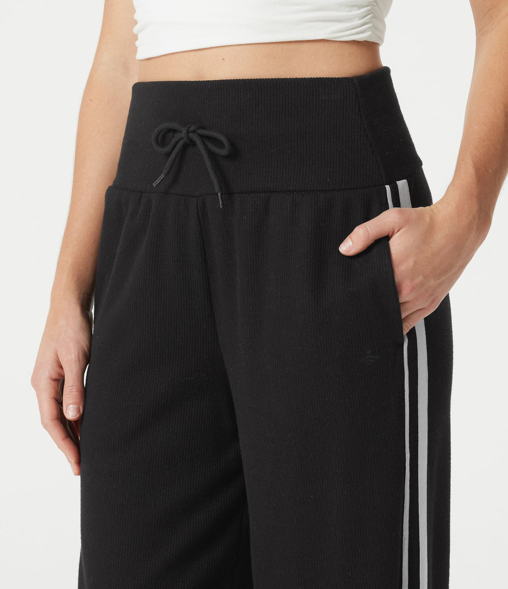 Pantalon baggy côtelé taille haute gainant avec cordon ajustable, bandes latérales et poches
