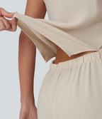 Combinaison casual aspect lin col rond échancré sans manches avec nœud frontal et poches – Easy Peasy