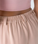 Pantalon tailleur ample, taille moyenne, coupe barrel, à poches