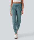 Pantalon jogging de voyage taille haute avec cordon de serrage, coupe fuselée et poches latérales zippées