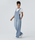 Salopette décontractée Halara Flex™ en denim extensible délavé, col V et poches latérales