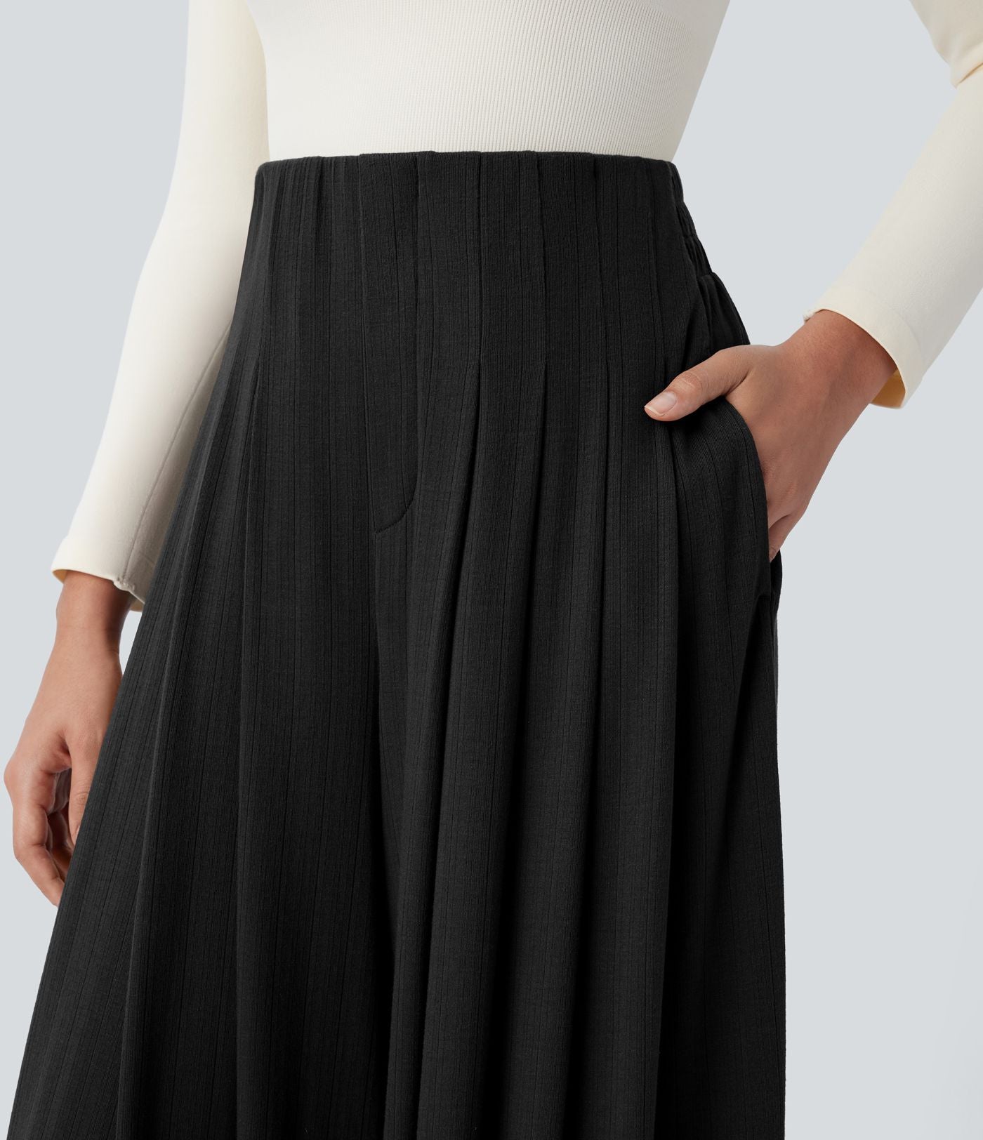 Pantalon décontracté ample à taille haute, plissé et à poches latérales