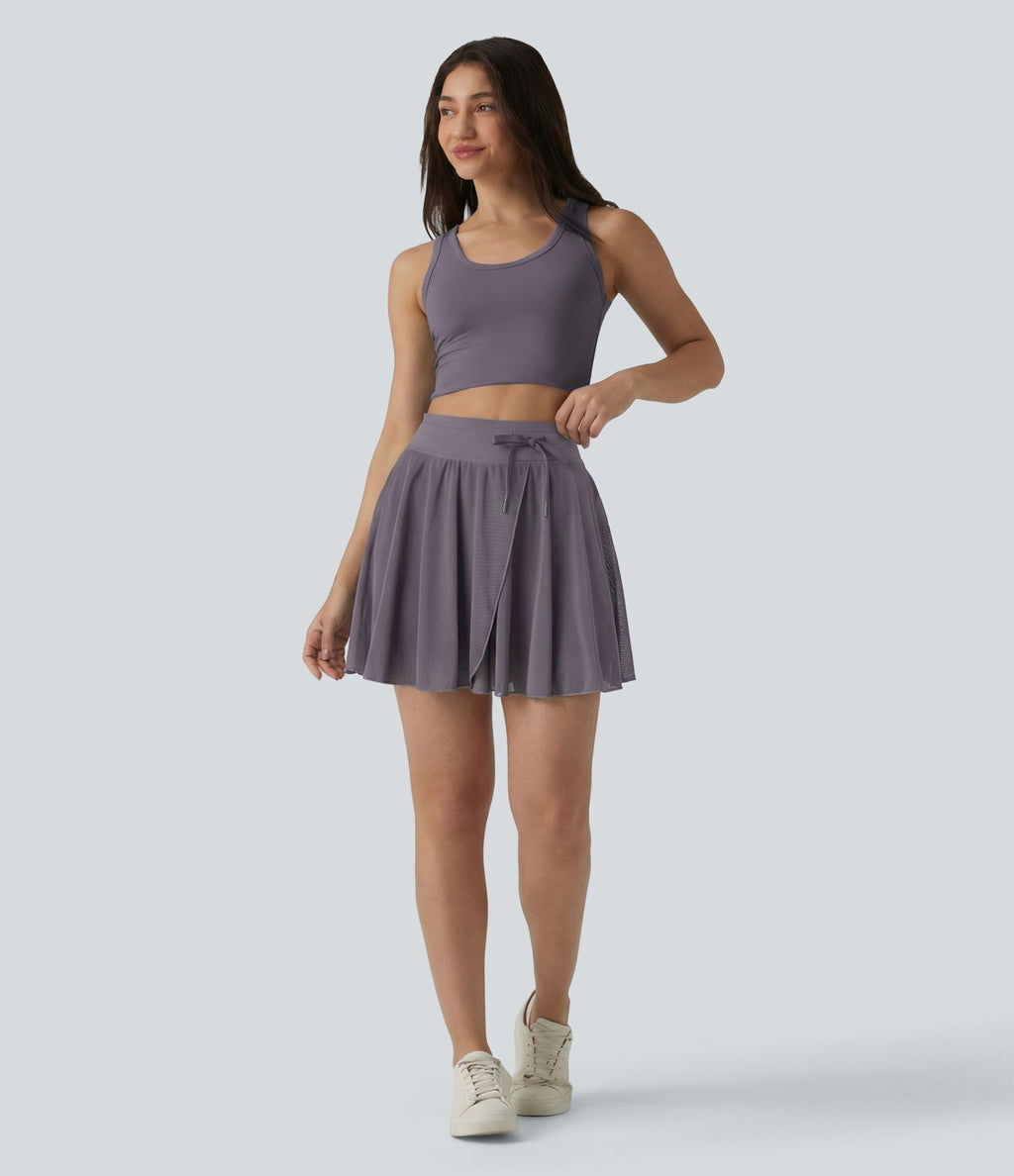 Jupe mini fluide évasée 2-en-1 taille haute à cordon, empiècements en mesh contrastant, avec poche, version plus longue