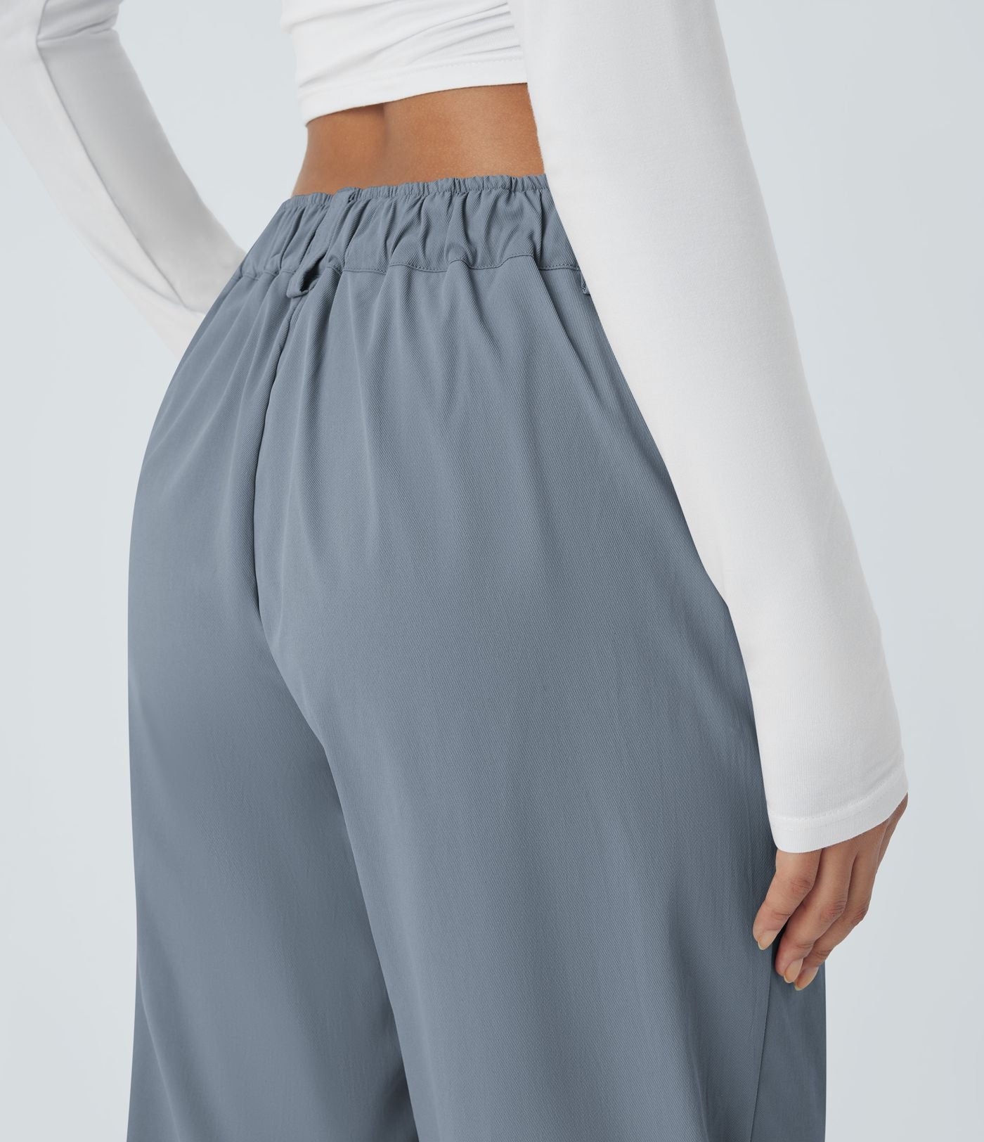 Pantalon décontracté droit taille moyenne à bouton, fermeture éclair et poches latérales