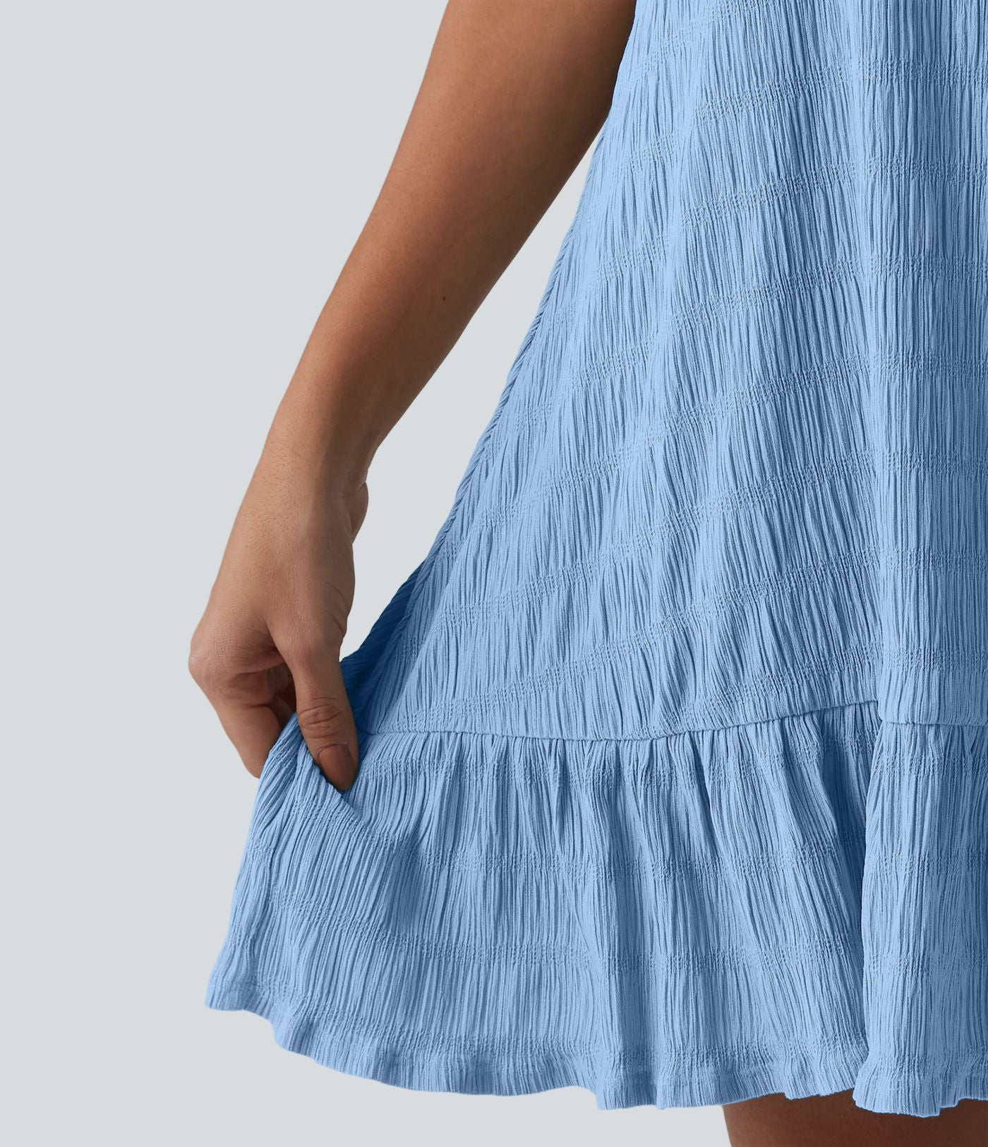 Robe courte décontractée sans manches à col rond, soutien-gorge intégré et ourlet à volants