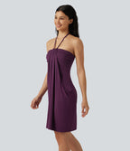Robe mini de plage à col halter avec brassière intégrée, lien noué au dos et poches