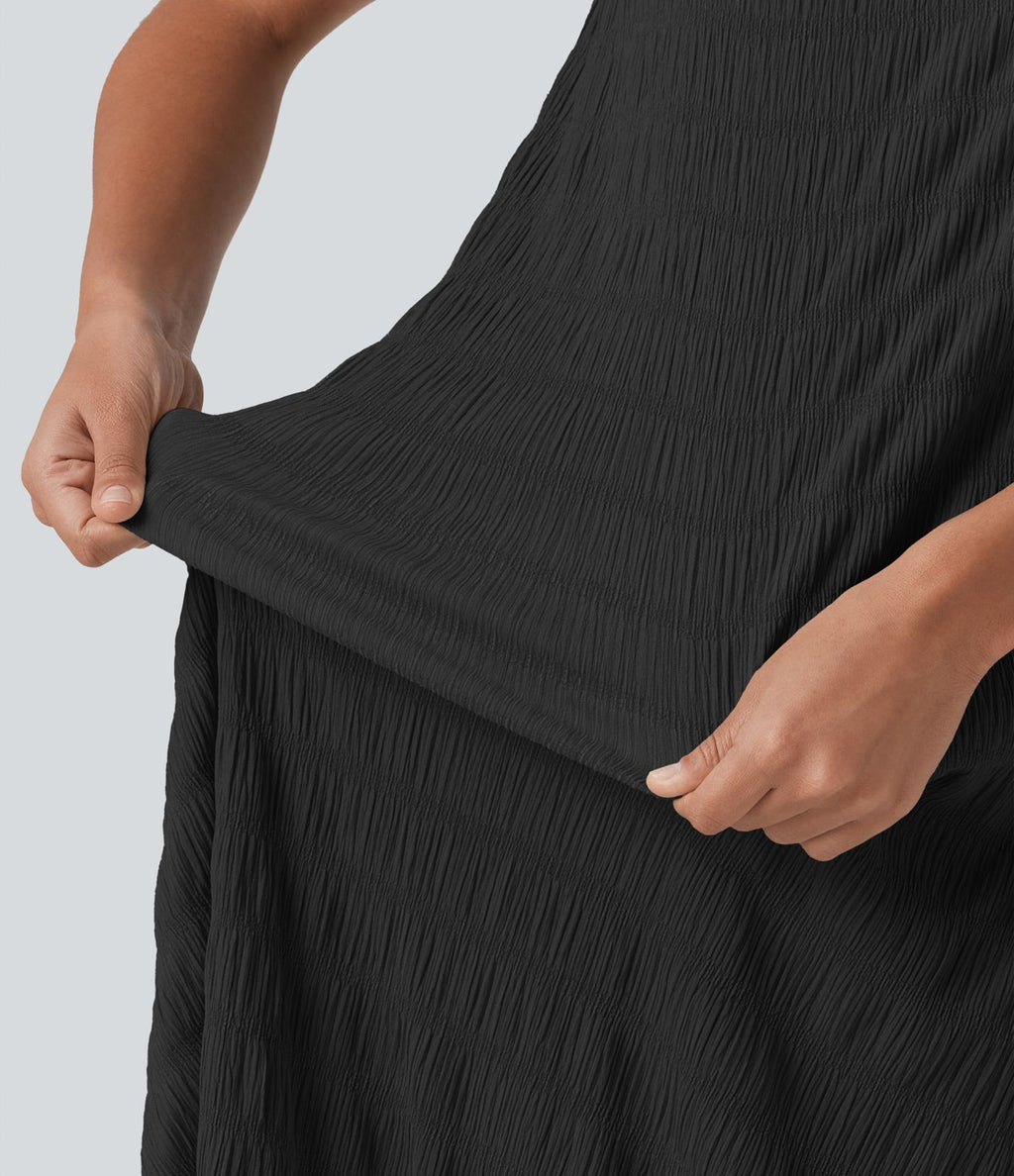 Robe midi sans manches à encolure arrondie avec coussinets amovibles et ourlet à volants