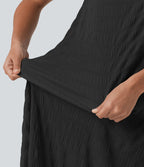 Robe midi sans manches à encolure arrondie avec coussinets amovibles et ourlet à volants