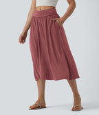 Jupe midi casual fluide croisée taille haute avec poches