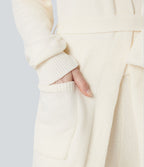 Robe d'intérieur longue tricot ouverte ceinturée manches longues avec poches