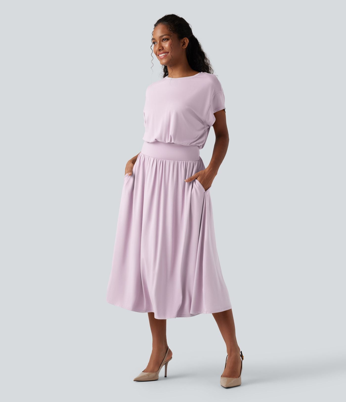 Robe de travail mi-longue fluide gainante à manches chauve-souris avec poches