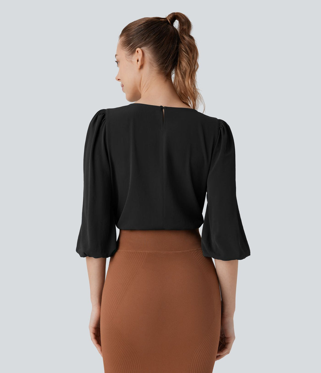 Blouse de travail col bateau avec manches évêque et dos ajouré