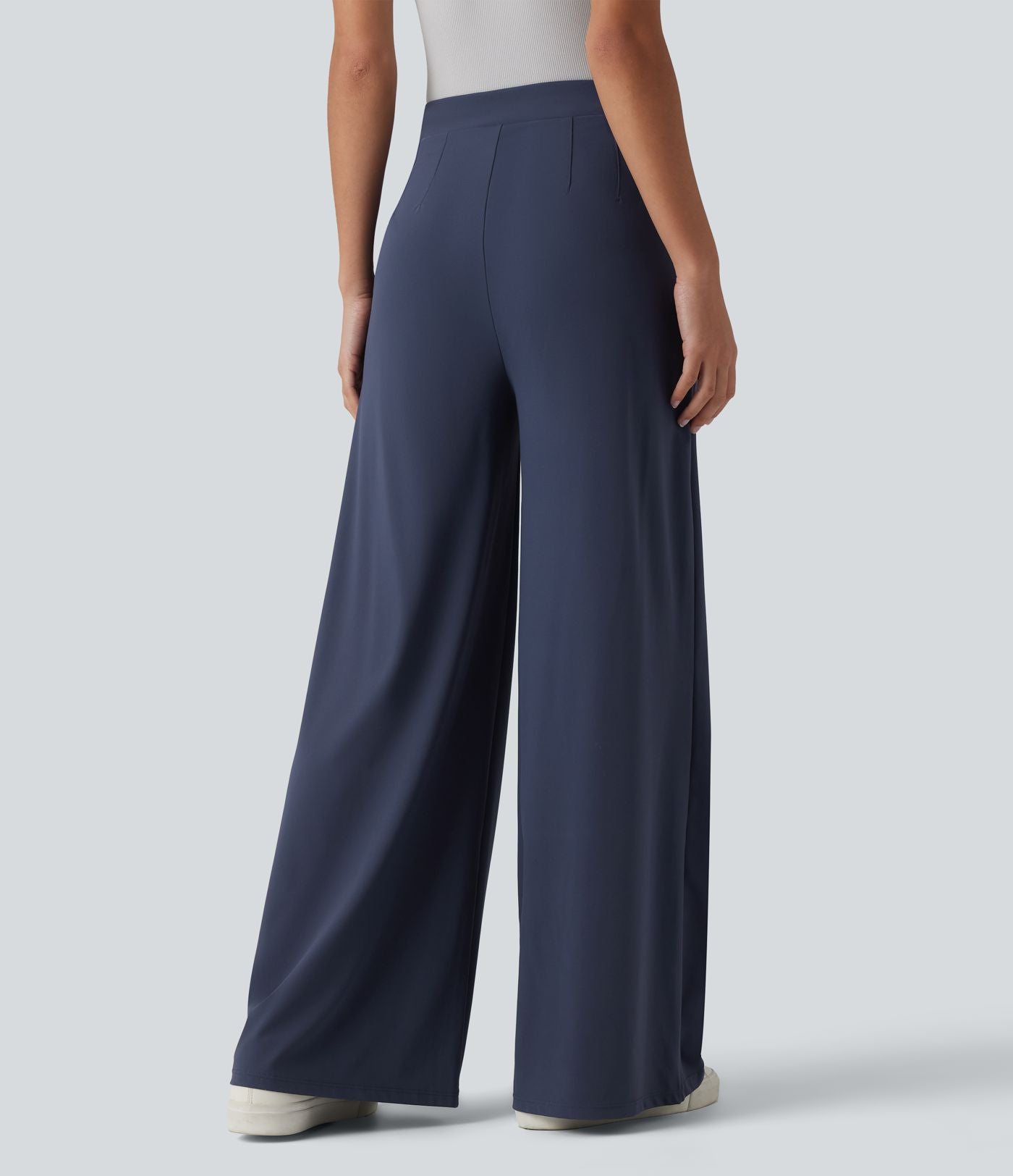 Pantalon tailleur évasé asymétrique taille mi-haute avec poches