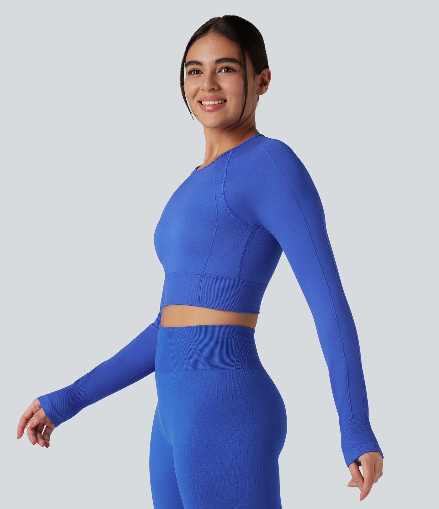 Haut de sport yoga court col rond à manches longues avec passants pouces sans couture OneForm Seamless Flow