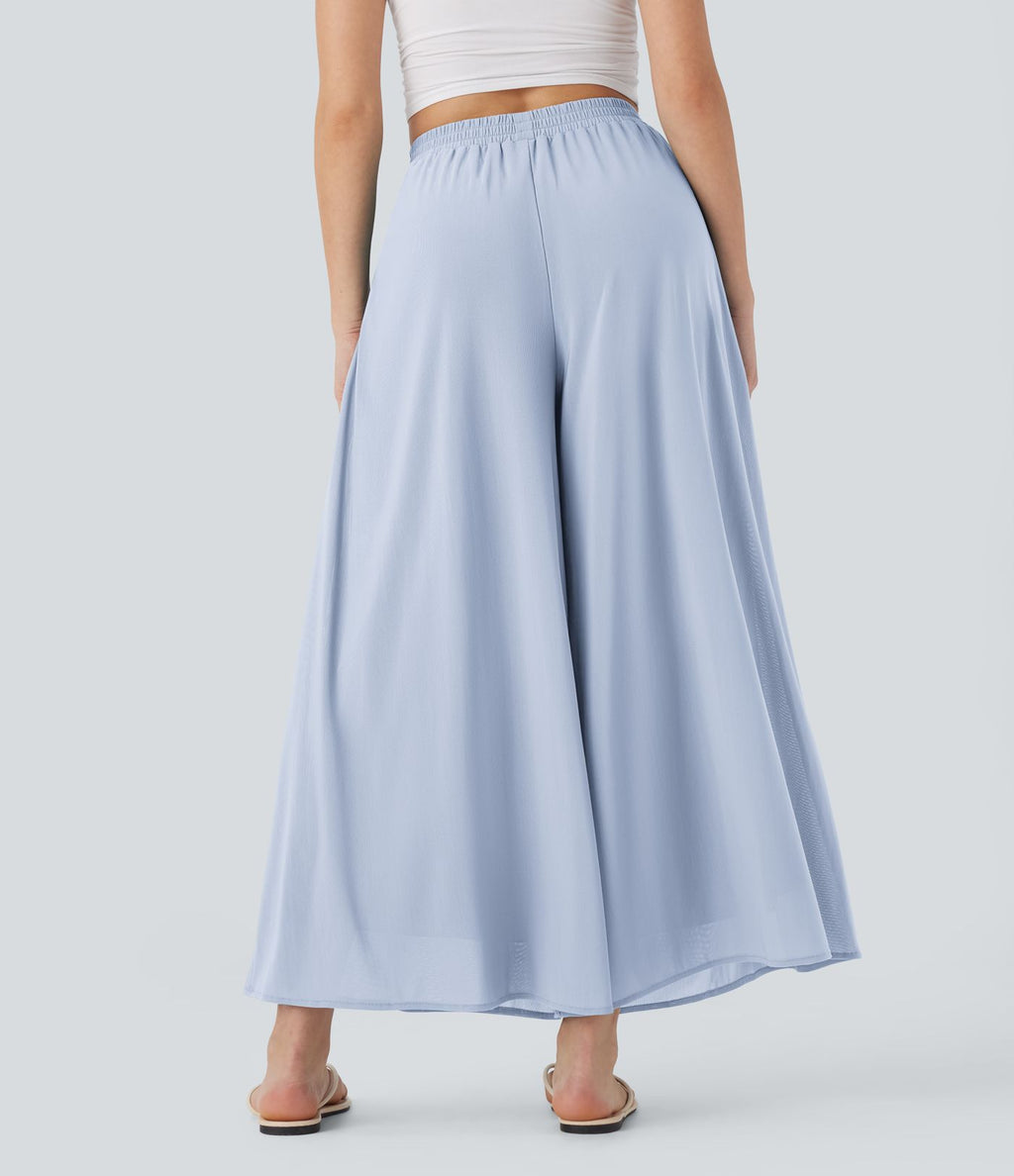 Pantalon fluide et ample avec superposition en mesh, poches latérales et taille haute