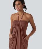 Robe resort mini dos nu à col licou avec lien noué dans le dos et poches