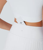Jupe-short de tennis courte plissée 2-en-1 gainante taille haute à séchage rapide avec poches Breezeful™