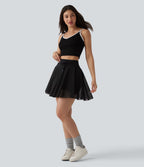 Jupe mini fluide évasée 2-en-1 taille haute à cordon, empiècements en mesh contrastant, avec poche, version plus longue