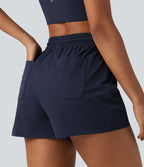 Short de sport baggy taille haute extensible en popeline avec cordon de serrage et poches