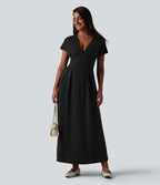 Robe midi à manches courtes chauve-souris et col en V avec poches