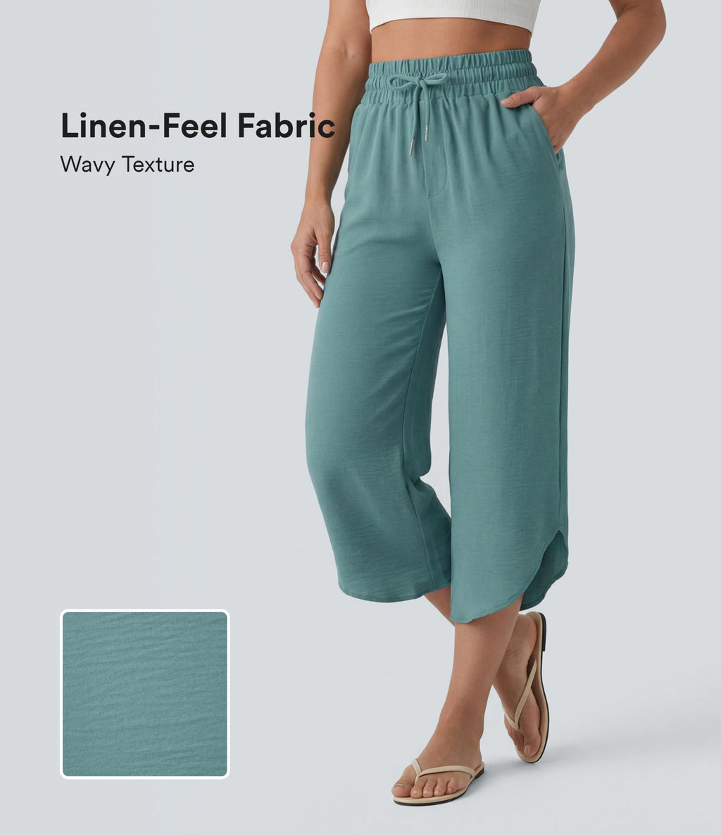Pantalon casual 7/8 taille haute aspect lin à cordon de serrage et ourlet arrondi avec poches