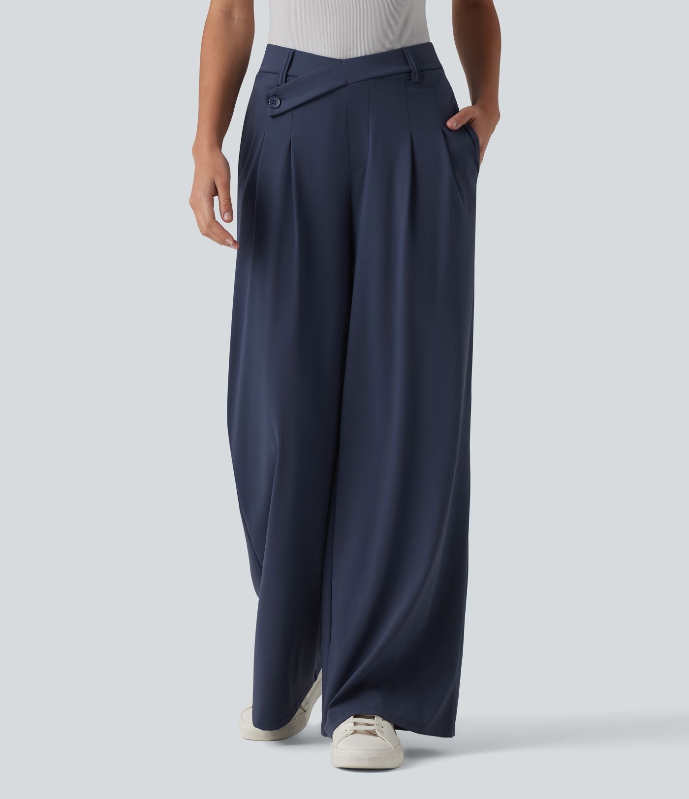 Pantalon tailleur évasé asymétrique taille mi-haute avec poches