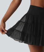 Jupe de tennis courte 2 en 1 fluide à taille haute et croisée avec poches - Longueur courte