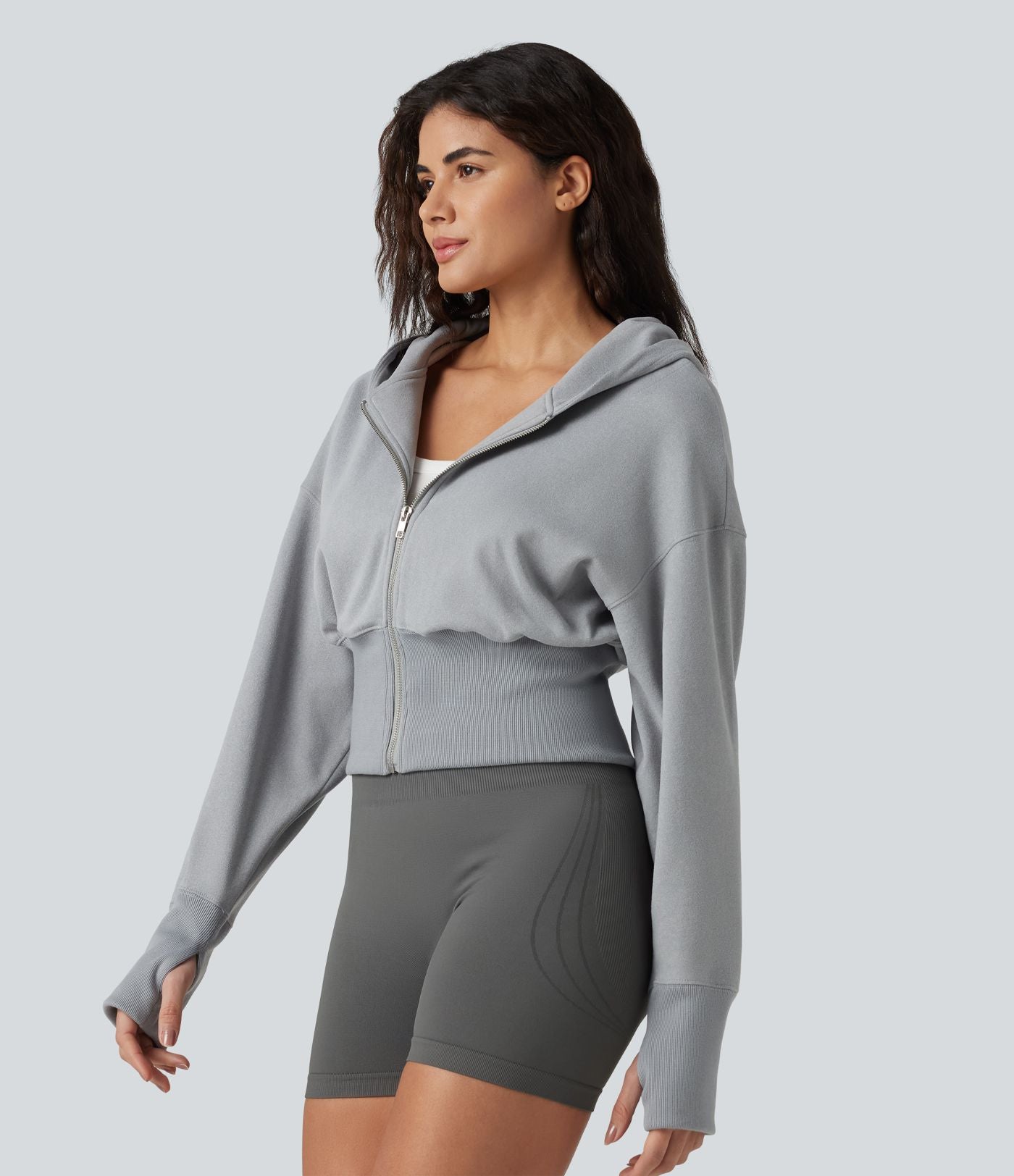 Sweat à capuche zippé avec manches raglan et passe-pouces