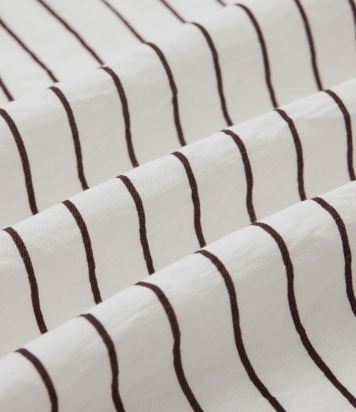 Chemise casual à rayures aspect lin col V manches longues retroussables et ourlet arrondi