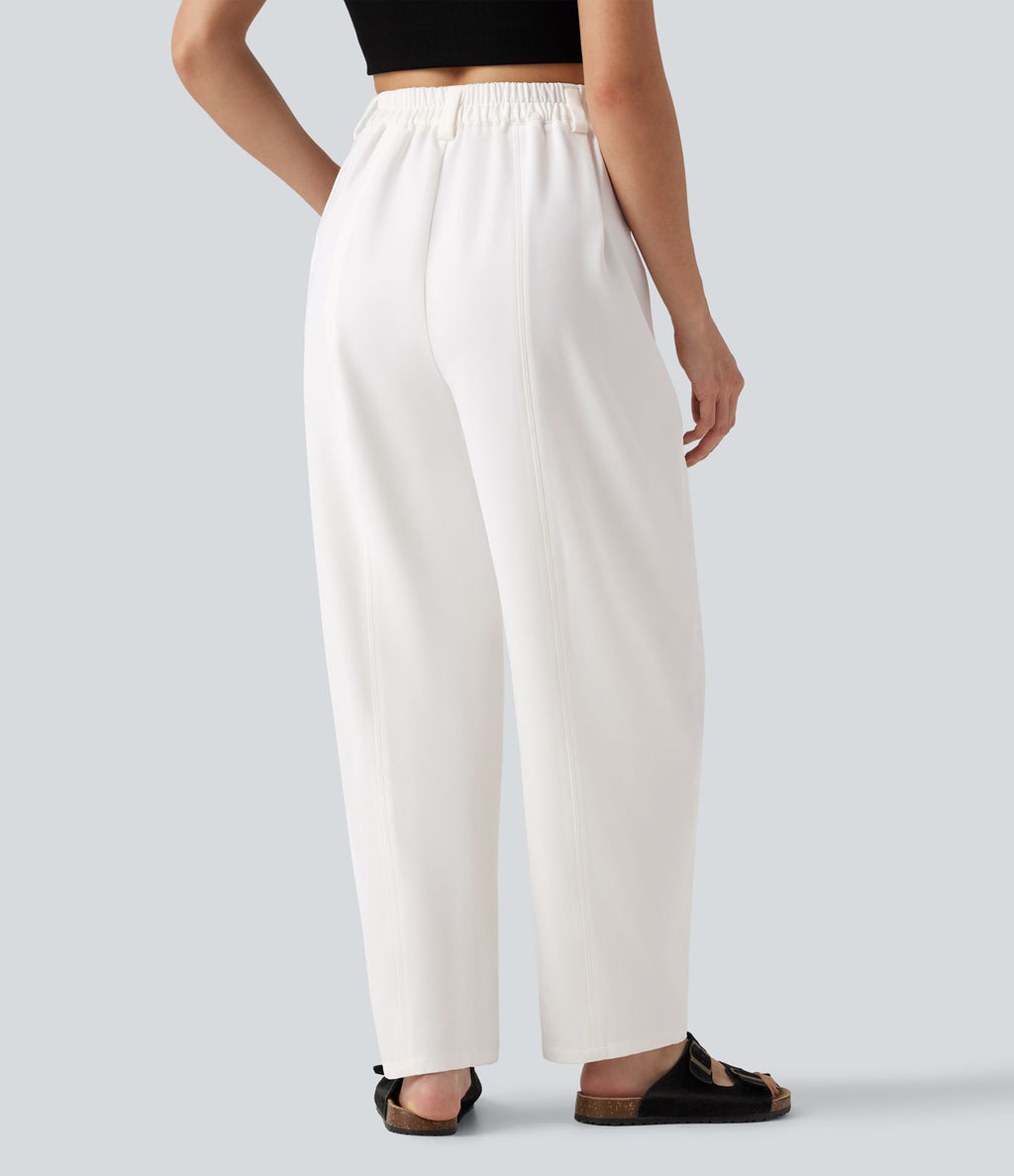 Pantalon tailleur ample, taille haute, coupe ballon, à poches