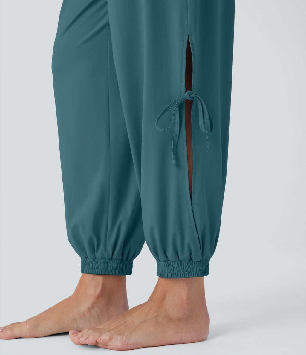 Combinaison de yoga col bateau sans manches dos nu avec découpes et poches latérales à cordon de serrage effet frais InstantCool, protection solaire UPF50+