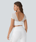 Haut de sport yoga court 2-en-1 dos nu col licou manches courtes mesh contrastant