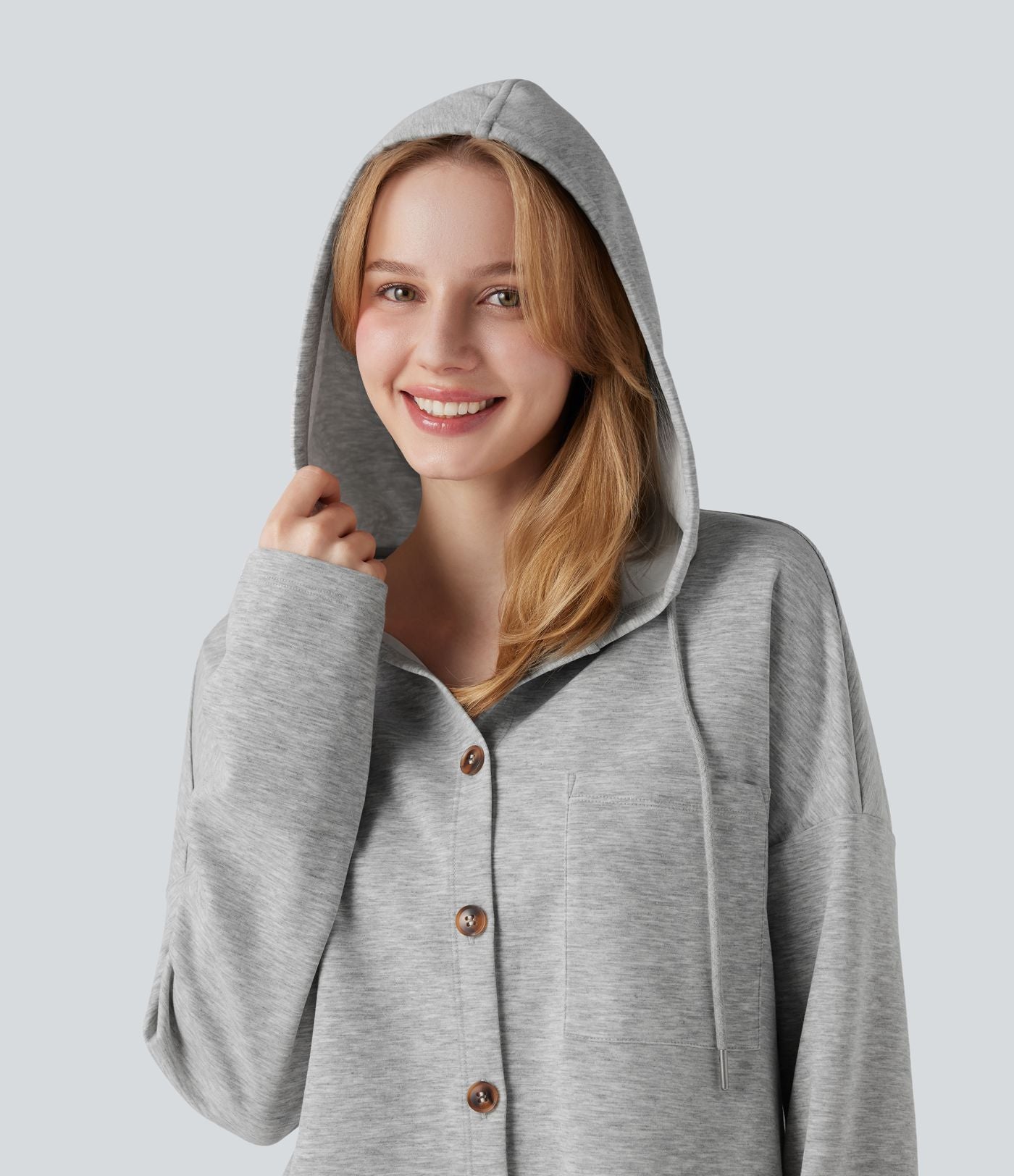 Sweat-shirt à capuche avec cordon de serrage à manches longues et ourlet arrondi avec poche
