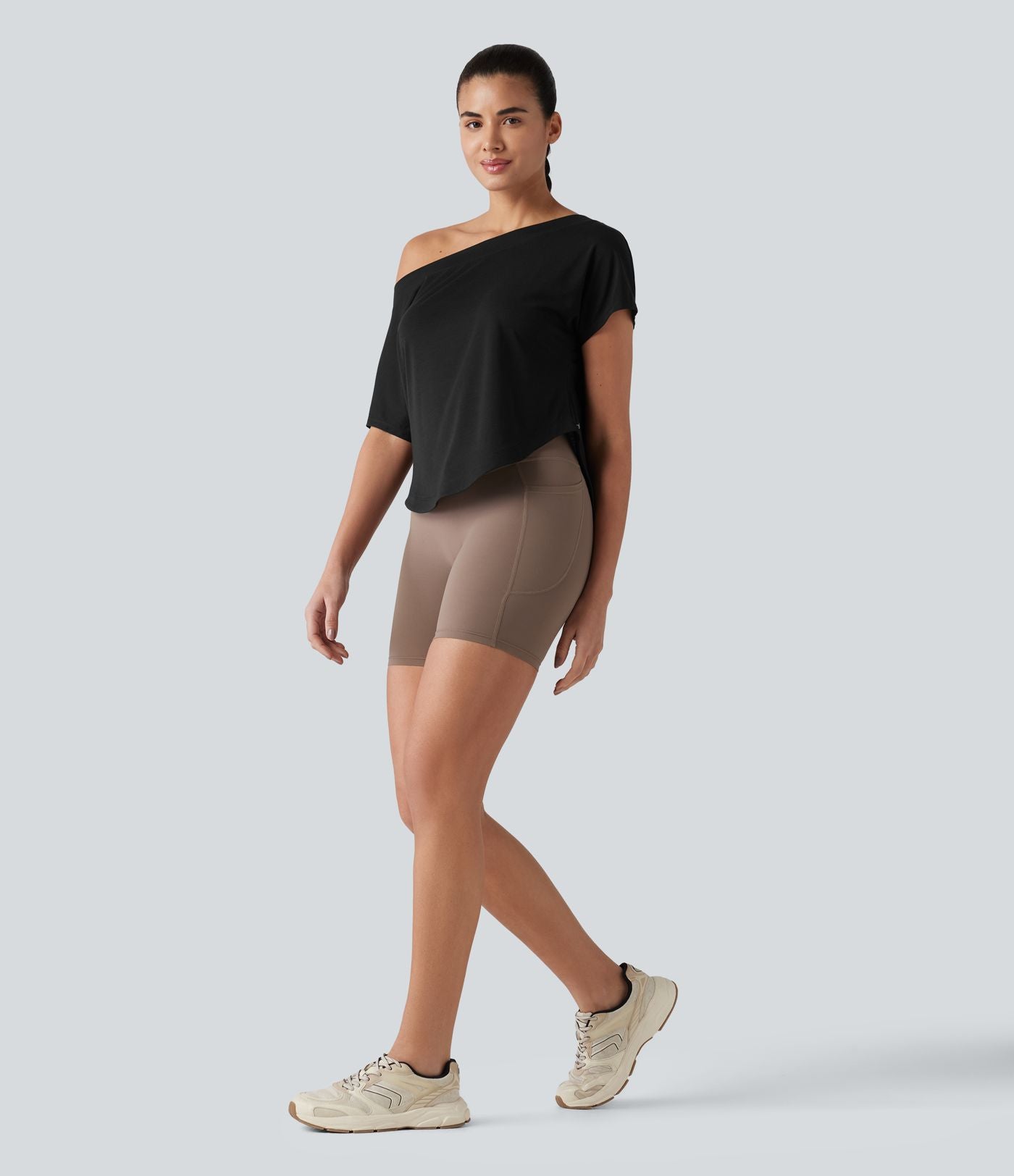 Haut de sport yoga asymétrique à une épaule manches courtes ourlet arrondi asymétrique séchage rapide