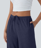 Pantalon fluide ample à taille basse avec cordon de serrage, côtes extensibles, doux pour la peau et poches latérales