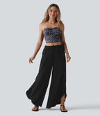 Pantalon ample décontracté à taille mi-haute, fentes, aspect lin, cordon de serrage et poches