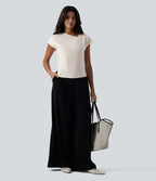 Blouse tailleur asymétrique col drapé manches courtes avec fronces et ourlet fendu